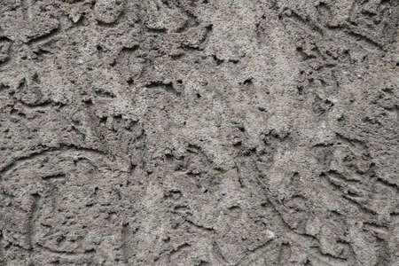 View of the gray texture of the wall of a building or structure, backgroundの写真素材