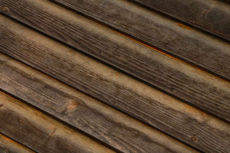 Dark wooden texture of the house or fence, backgroundの写真素材