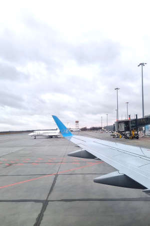 Warsaw, Poland, February 5, 2021: view from the airplane window at the airport.