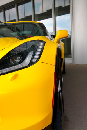 Wroclaw, Poland, August 22, 2021: front view of the beautiful optics of a modern yellow sports expensive car.のeditorial素材
