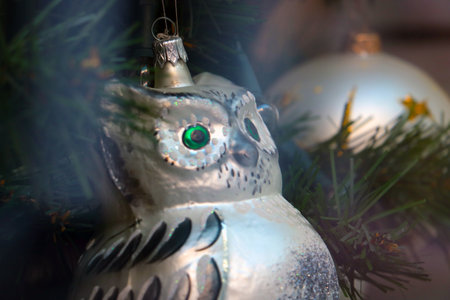 A beautiful bright toy hangs on the Christmas treeの写真素材