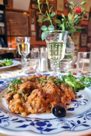 Close-up of a plate of food on a table in a cafeの写真素材