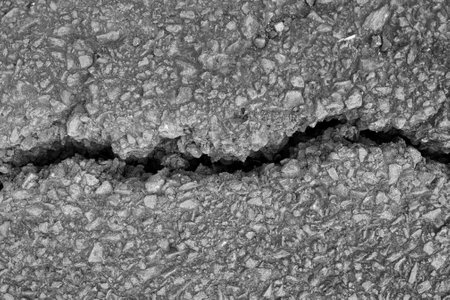 View of a crack in the ground, asphalt texture