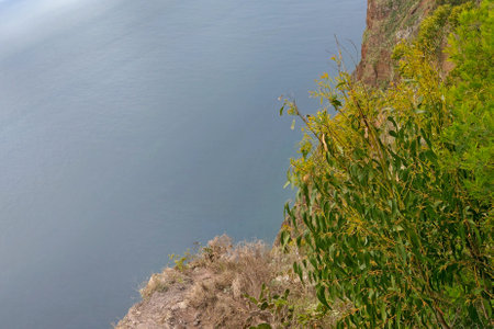 View from the cliff of the rock to the water. View from a heightの写真素材