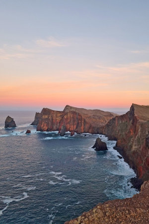 A picturesque sunset on the island of Madeira in the Atlantic Oceanの写真素材