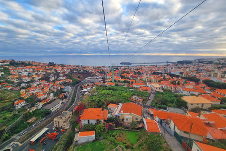 View from the cable car to the rooftops of houses in Funchalの写真素材