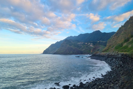 A picturesque beautiful sunset on the shores of the island of Madeira in the Atlantic Oceanの写真素材