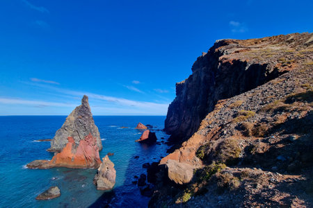 Steep rocky coast of Madeira island. Island in the Atlantic Oceanの写真素材