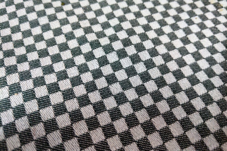 Black and white checkered pattern texture suitable for diverse applications including fabric design,...