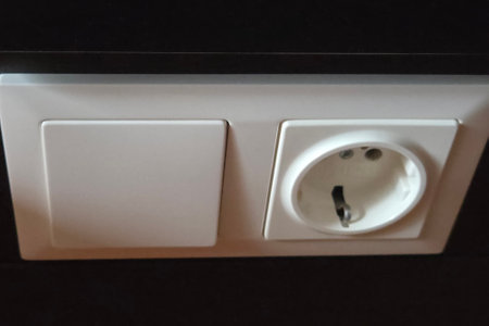 European-style electrical outlet with a sleek, modern design, ideal for contemporary interiors. the...