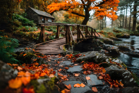 A serene autumn scene featuring a rustic wooden bridge surrounded by vibrant orange foliage. a quaint cabin nestles among trees, with fallen leaves adding texture to the mossy rocks and gentle stream. Generative AIの素材