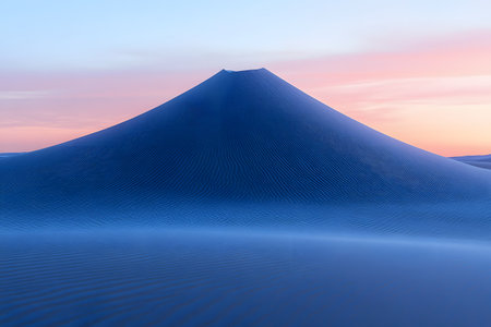 A serene desert landscape featuring a prominent sand dune under a vibrant sunset sky. the scene showcases soft gradients of blue and pink, the delicate patterns of ripples in the sand, creating a tranquil, mystical atmosphere. Generative AIの素材