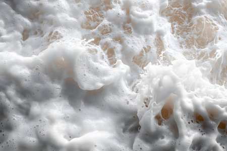 Dynamic close-up of ocean foam offers a mesmerizing view of natural textures and swirling patterns, ideal for creative backgrounds or nature-themed design projects, exuding a sense of movement and tranquility. Generative AIの素材