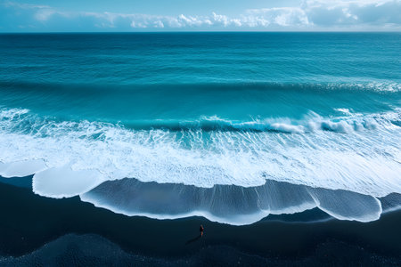 A powerful ocean wave gracefully approaches a black sand beach, contrasting the vibrant turquoise of the water with the deep dark hue of the shoreline. this scenic view embodies tranquility and the raw beauty of nature. Generative AIの素材