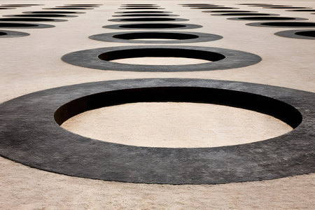 Geometric Pattern of Circular Shadows on Concrete Surface for Modern Design Concepts Generative AIの素材
