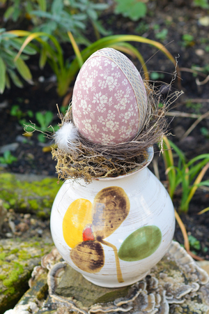 Easter egg in a garden.の写真素材