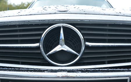 LE MANS, FRANCE - APRIL 30, 2017: Black Mercedes Benz logo close up Old model