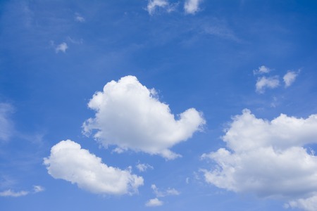 Sky blue background cloudsの写真素材