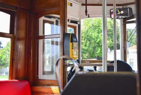 Interior of a old famous yellow elevator tram 28 in Lisbon, Portugalの写真素材