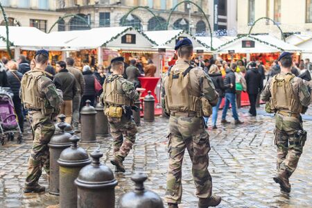 ROUEN, FRANCE - DECEMBER 08, 2019: A group of military patrols in the Christmas market