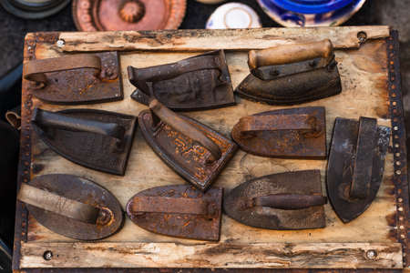 Set of rusty cast iron on a flea marketの写真素材