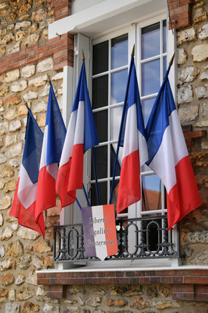 PARIS, FRANCE - SEPTEMBER 03, 2022: Hotel de Ville City Hall with french flagsのeditorial素材