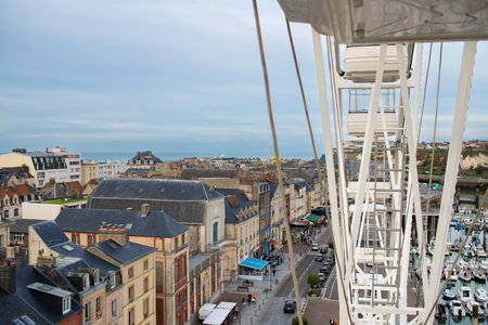 DIEPPE, FRANCE - OCTOBER 22, 2022: Top view from the ferris wheel to the city of Dieppe and the Atlantic oceanのeditorial素材