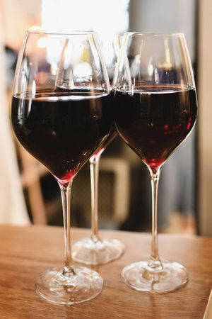 Glasses with red French wine in a restaurant