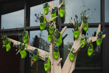 Green Dutch wooden clogs with flowers insideの写真素材