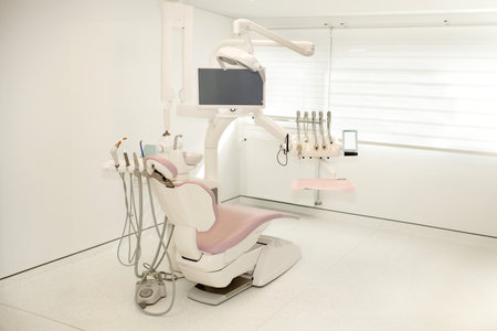 Pink dental chair in a modern dental officeの写真素材