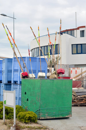 Fishing rods in a containerの写真素材