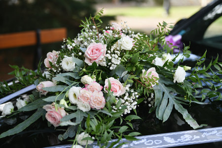 Wedding car with flowers on the hood for the wedding day.Floristicsの写真素材