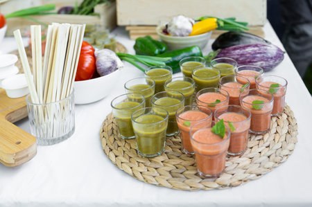 Fresh organic eco vegetables and verrines on a catering table for a wedding or birthdayの写真素材