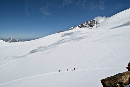 alpinist on lys glacier on monte rosa