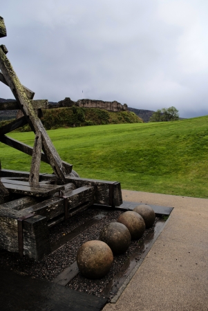 ancient catapult in front of urquhart castleの写真素材