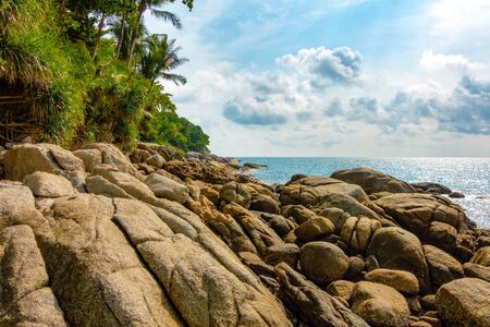Tropical Sea coast with large rocks.の写真素材