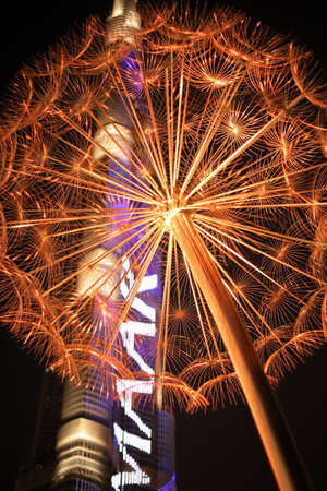 Burj Khalifa and dandelion sculpture illuminated by lights. United Arab Emirates Dubai March 2019のeditorial素材