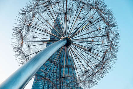 Burj Khalifa and dandelion sculptures. United Arab Emirates Dubai March 2019