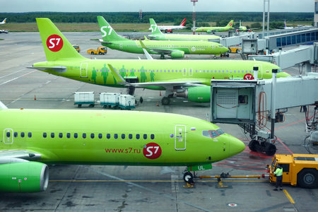 Domodedovo airport, airline planes S7 are at the airport. Russia, Moscow Domodedovo July 2020のeditorial素材