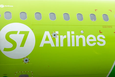 S7 passenger plane is at the airport, close-up. Russia, Moscow Domodedovo July 2020