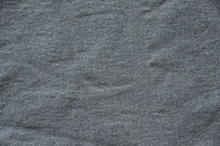 Denim texture of gray fabric.の写真素材