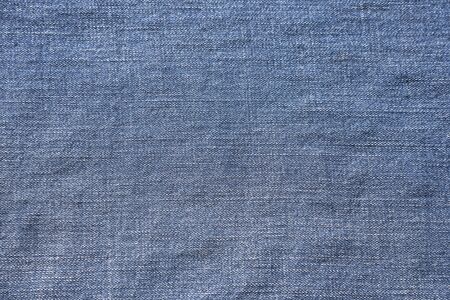 Denim texture of blue fabric.の写真素材
