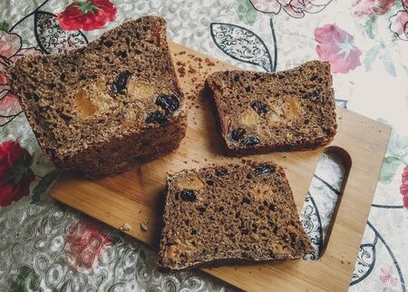 On a slice of fresh bread its porous and magnificent structure is visible.の写真素材