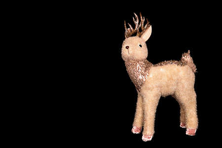 Close-up on a black background object photography still life of Christmas toy reindeer Santa Claus.の写真素材