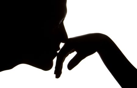 man kissing womans hand  silhouetteの写真素材