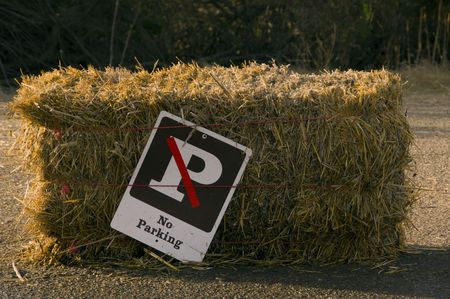 No parking sign hanging on hay.の写真素材