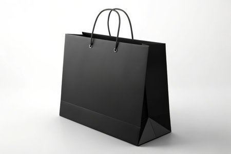 Black paper bag on white backgroundの素材