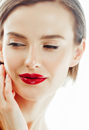 Beauty Woman face Portrait. Beautiful model Girl with Perfect Fresh Clean Skin color lips purple red. Blonde brunette short hair Youth and Skin Care Concept. Isolated on a white backgroundの写真素材