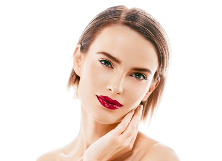 Beauty Woman face Portrait. Beautiful model Girl with Perfect Fresh Clean Skin color lips purple red. Blonde brunette short hair Youth and Skin Care Concept. Isolated on a white backgroundの写真素材