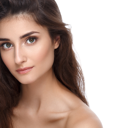 Beautiful Face of Young Woman Model with Clean Fresh Perfect Healthy Skin. Age and Health Concept. Beauty Woman Portrait isolated on whiteの写真素材